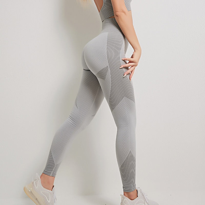 Matching set sports bra, cropped jacket, and leggings